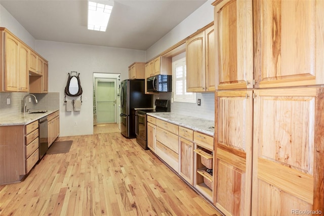 523 Pulver Rd, Lake George, CO 80827 - kitchen with stainless steel microwave, range with electric stovetop, light brown cabinets, and dishwashing machine