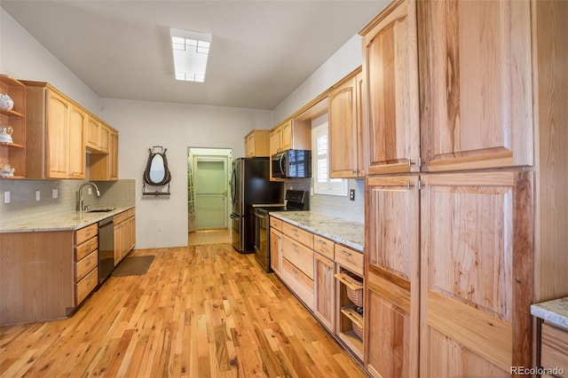 523 Pulver Rd, Lake George, CO 80827 - kitchen with stainless steel appliances, open shelves, light brown cabinetry, and tasteful backsplash