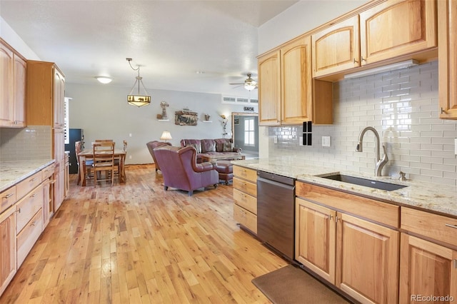 523 Pulver Rd, Lake George, CO 80827 - kitchen featuring dishwasher, open floor plan, tasteful backsplash, and light wood-style floors