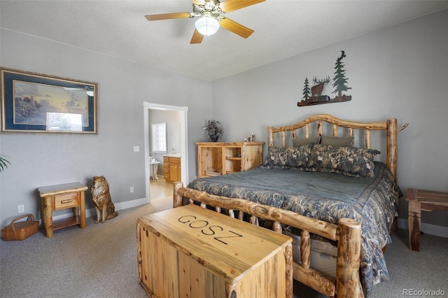 523 Pulver Rd, Lake George, CO 80827 - carpeted bedroom featuring ensuite bath and a ceiling fan