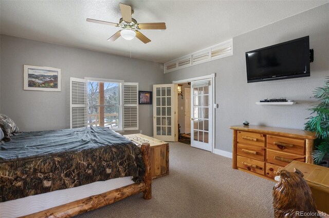 523 Pulver Rd, Lake George, CO 80827 - carpeted bedroom featuring french doors and ceiling fan