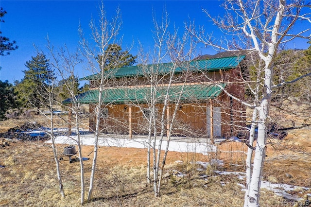 523 Pulver Rd, Lake George, CO 80827 - view of side of home with a metal roof