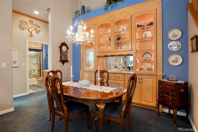5155 W Quincy Ave Unit L101, Denver, CO 80236 - dining area featuring dark carpet and a chandelier
