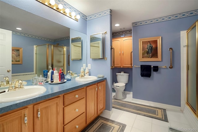 5155 W Quincy Ave Unit L101, Denver, CO 80236 - full bathroom with a shower stall, double vanity, recessed lighting, and tile patterned flooring
