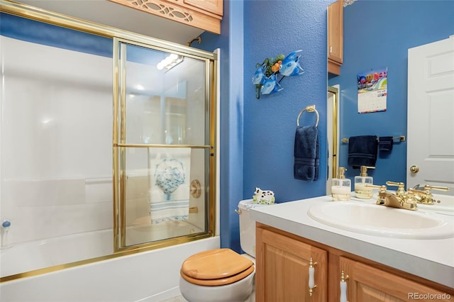 5155 W Quincy Ave Unit L101, Denver, CO 80236 - bathroom with vanity, enclosed tub / shower combo, and a textured wall
