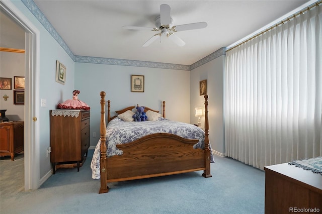 5155 W Quincy Ave Unit L101, Denver, CO 80236 - bedroom with carpet flooring and a ceiling fan