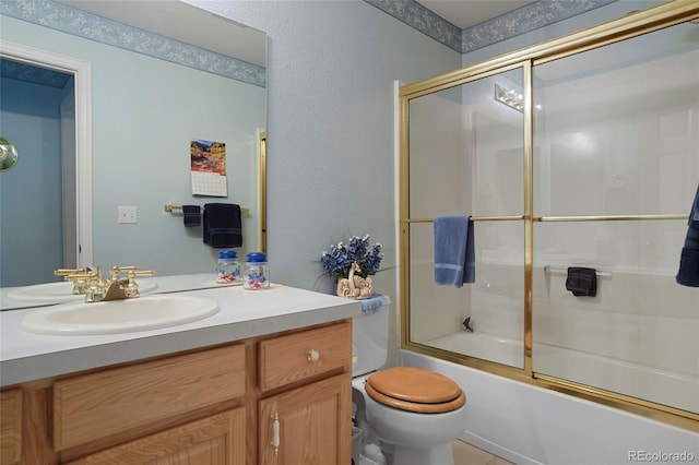 5155 W Quincy Ave Unit L101, Denver, CO 80236 - full bathroom featuring vanity and shower / bath combination with glass door