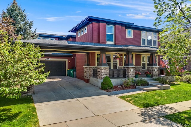 13324 W 86th Dr, Arvada, CO 80005 - view of front of home with covered porch, concrete driveway, brick siding, and a front yard