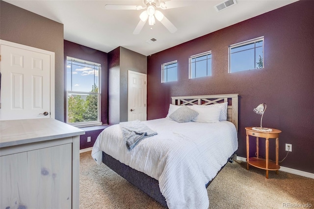 13324 W 86th Dr, Arvada, CO 80005 - bedroom featuring light colored carpet, baseboards, and a ceiling fan