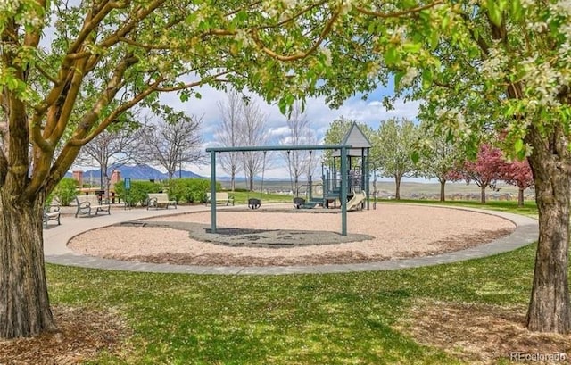 13324 W 86th Dr, Arvada, CO 80005 - view of community with a mountain view and a lawn