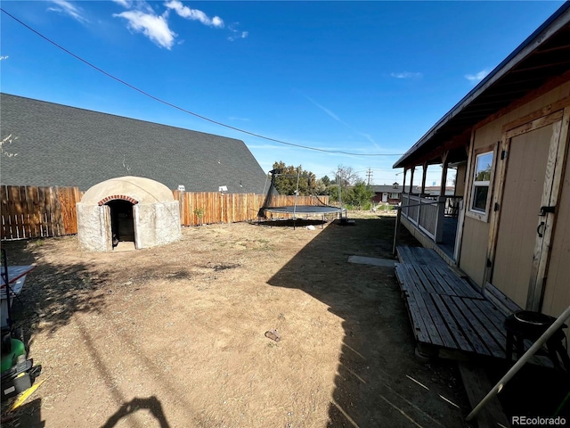 view of yard with a trampoline