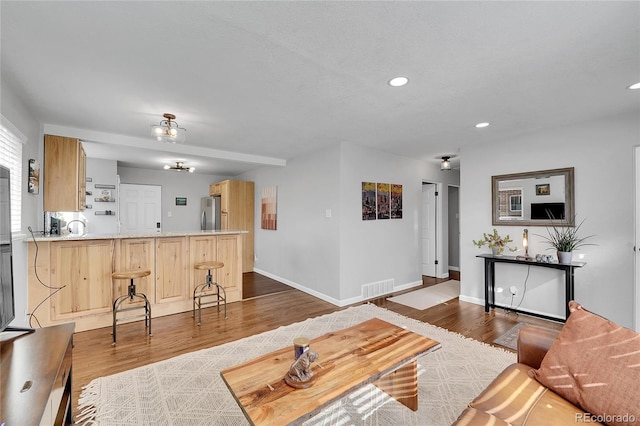 living room with dark wood-type flooring