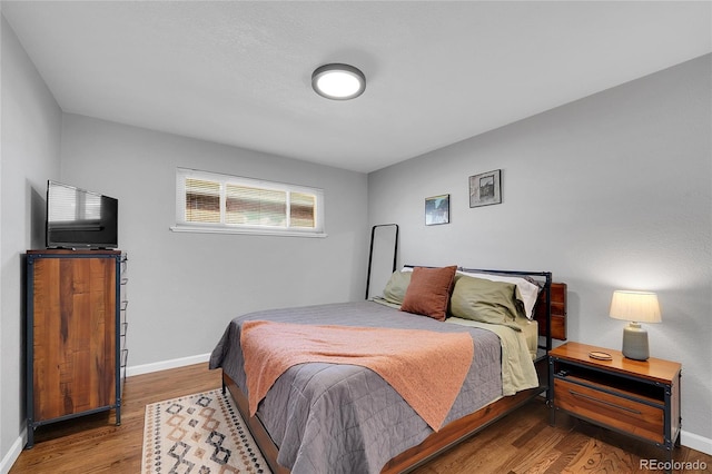 bedroom featuring hardwood / wood-style floors