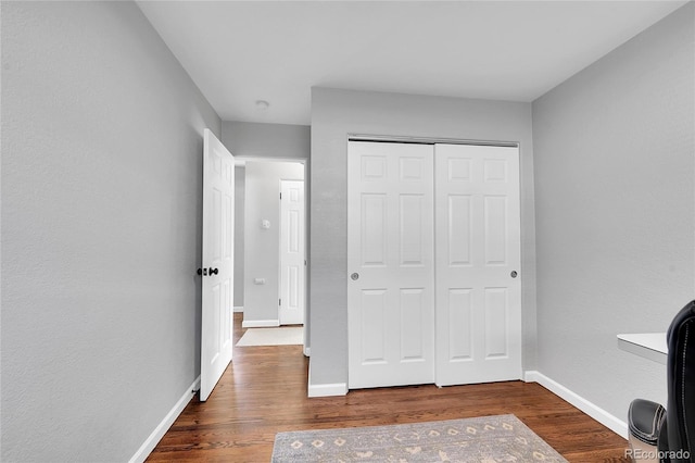 unfurnished office featuring hardwood / wood-style flooring