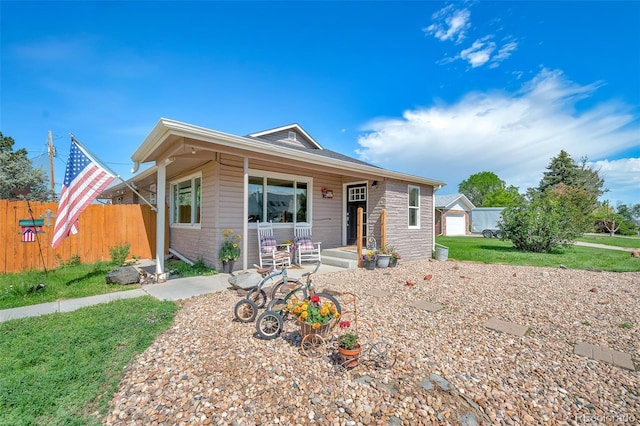 1775 Longbranch St, Strasburg, CO 80136 - view of front of home featuring a porch and brick siding