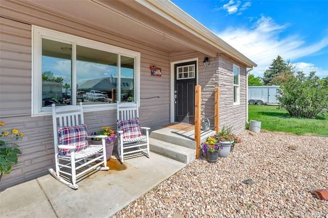 1775 Longbranch St, Strasburg, CO 80136 - view of exterior entry featuring stone siding