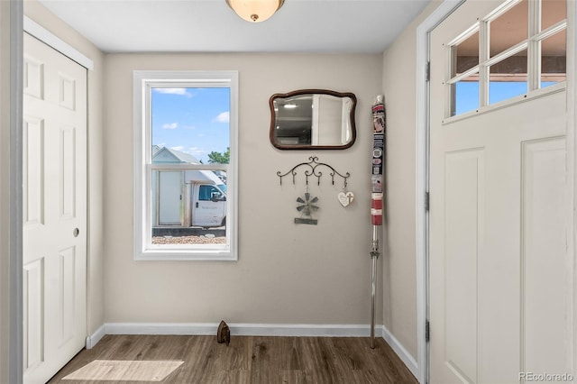 1775 Longbranch St, Strasburg, CO 80136 - entryway with wood finished floors and baseboards