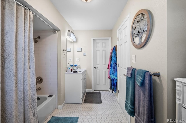 1775 Longbranch St, Strasburg, CO 80136 - bathroom with vanity and shower / tub combo with curtain