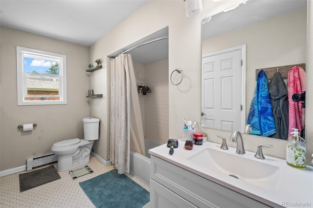1775 Longbranch St, Strasburg, CO 80136 - bathroom featuring a baseboard radiator, vanity, and shower / bath combo with shower curtain