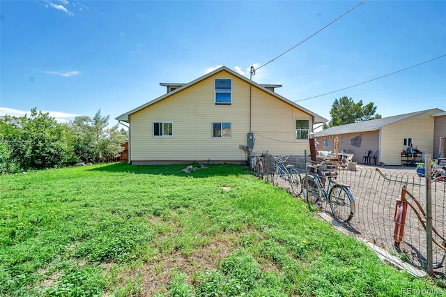 1775 Longbranch St, Strasburg, CO 80136 - rear view of property featuring a patio area