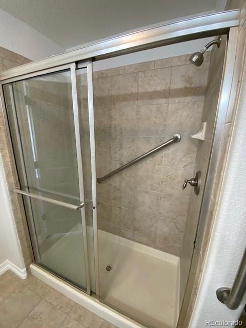 bathroom featuring walk in shower