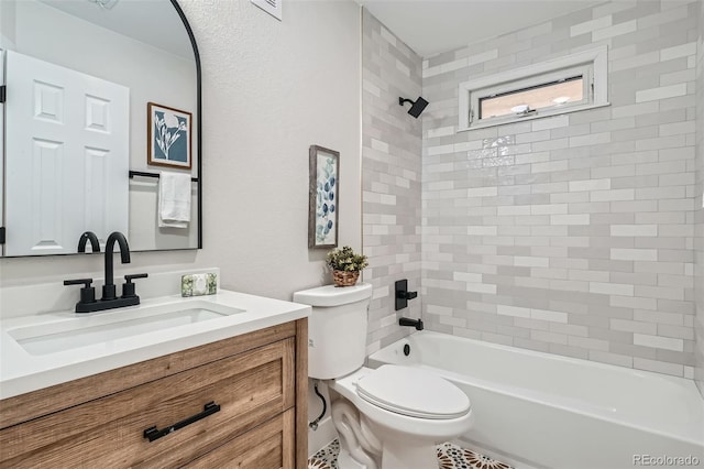 bathroom with vanity, toilet, and shower / washtub combination