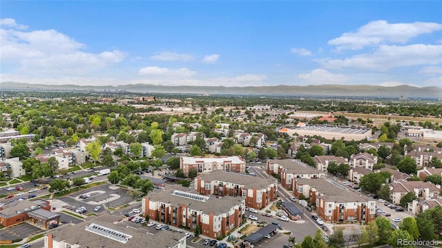 birds eye view of property featuring a mountain view