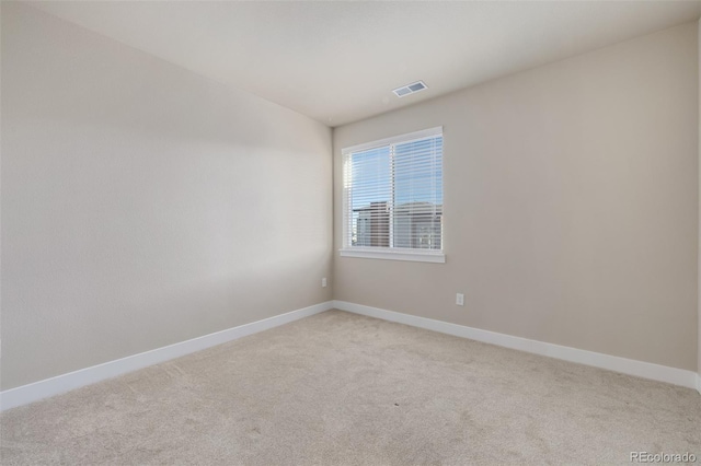 view of carpeted spare room