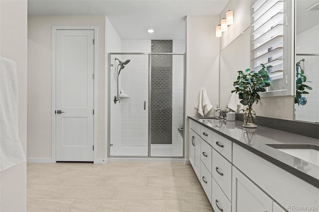 11103 Cloud Shadow St, Littleton, CO 80125 - full bath with double vanity, a stall shower, and recessed lighting