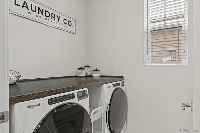 11103 Cloud Shadow St, Littleton, CO 80125 - washroom featuring washer and dryer and healthy amount of natural light