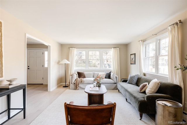 living room with light hardwood / wood-style floors