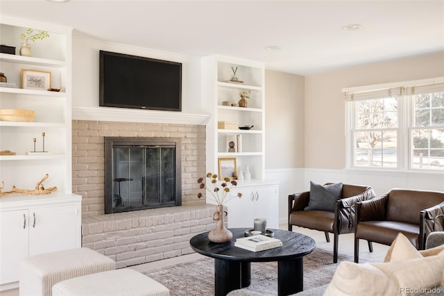 living room featuring a fireplace