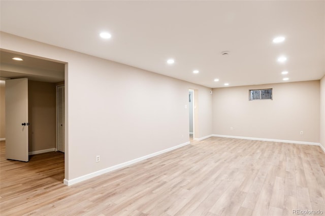 basement featuring light hardwood / wood-style floors