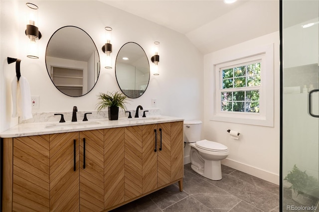 bathroom with vanity, vaulted ceiling, a shower with door, tile patterned flooring, and toilet