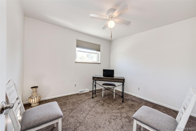 carpeted office with ceiling fan