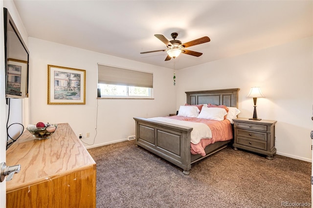 bedroom with dark colored carpet and ceiling fan