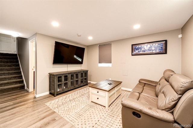 living room with light hardwood / wood-style floors