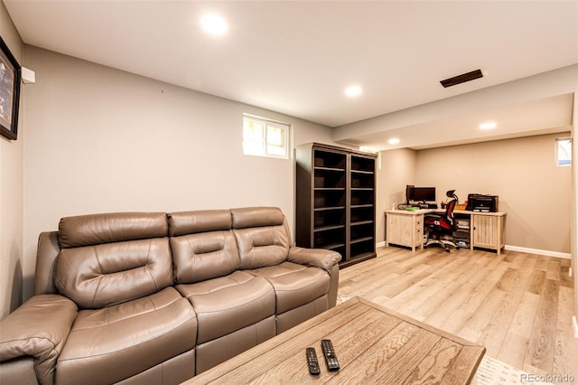 living room with light hardwood / wood-style floors