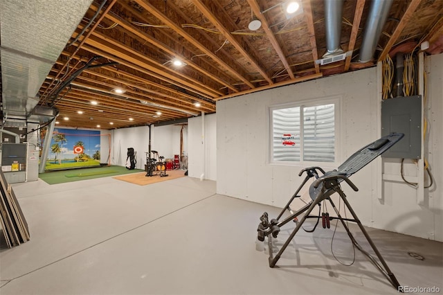 basement featuring electric panel and visible vents