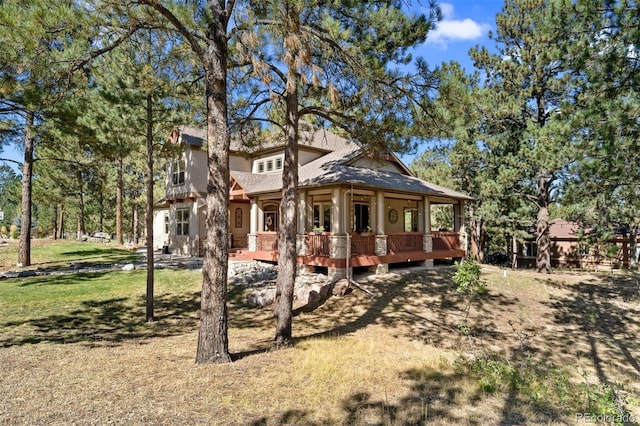 view of front of property featuring a front yard and stucco siding