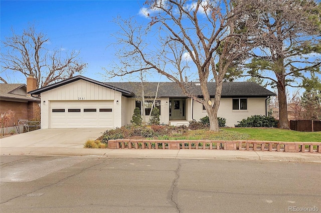 2961 S Rosemary St, Denver, CO 80231 - single story home with a garage and driveway