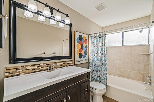 full bathroom with tasteful backsplash, vanity, shower / bath combination with curtain, and toilet