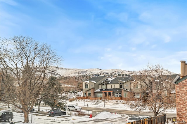 view of front of home featuring a mountain view