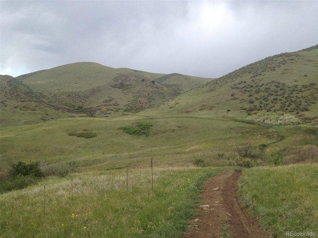 property view of mountains featuring a rural view