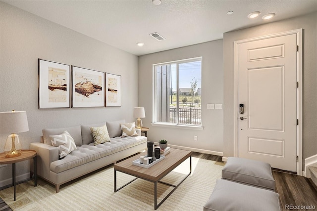 living room with dark wood-type flooring