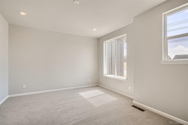 view of carpeted spare room