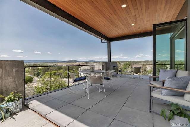 202 October Pl, Castle Rock, CO 80104 - view of patio featuring a mountain view and a balcony