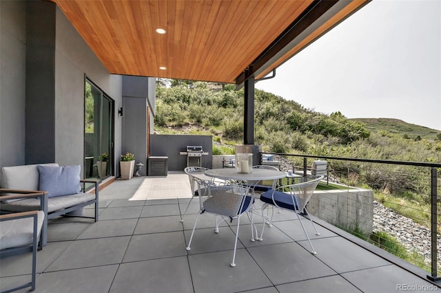 202 October Pl, Castle Rock, CO 80104 - view of patio / terrace featuring area for grilling and a balcony