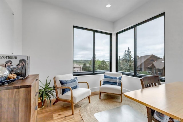202 October Pl, Castle Rock, CO 80104 - sitting room featuring wood finished floors, baseboards, and recessed lighting