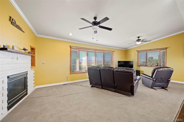 carpeted living room featuring a brick fireplace, a wealth of natural light, and ornamental molding